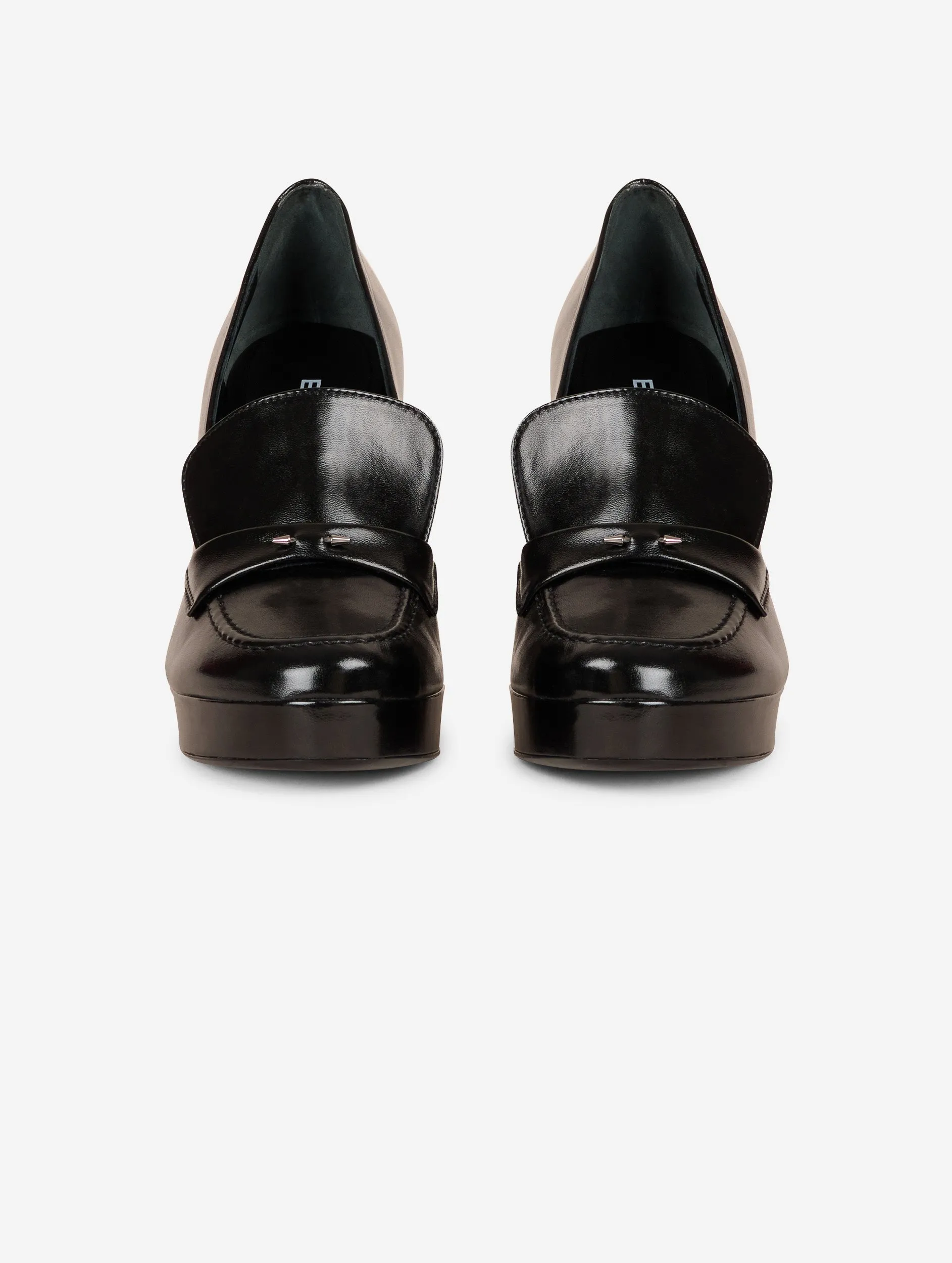 Heeled loafers in black patent leather